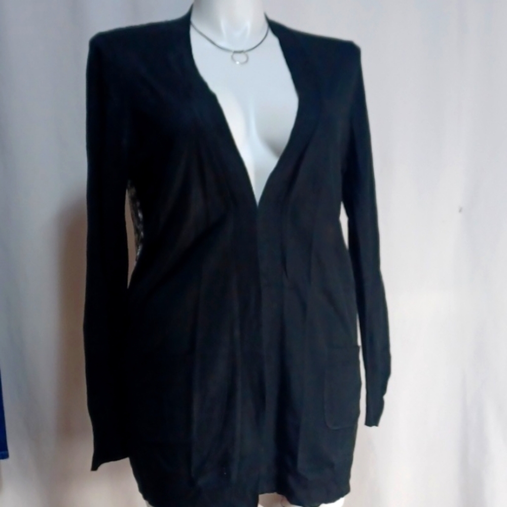 Beautiful wrap or light weight jacket size XL see thru back panel